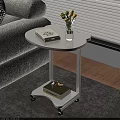 White Side Table With Wheels Books Vase And Decorative Items In Living Room