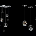 Multiple Hanging Spherical Glass Pendants Featuring Snowflake And Little House Decorative Designs