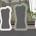 Two Stylish Mirrors With Decorative Frames In Room With Window Blinds Curtains And Potted Plant