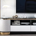 Modern Luxury TV Stand With Glass Top Gold Accents And Decorative Items In Living Room