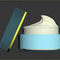 Open Blue Cream Jar With Yellow Accent And White Cream Inside