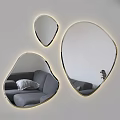 Irregular Shaped Backlit Mirrors With Golden Frame On Wall Reflecting Gray Sofa In Modern Interior