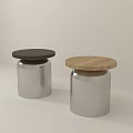 Modern Stools Featuring Silver Metal Base And Round Black Wooden Top Design