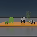 Art Installation Panda And Bear Sculptures Using Building Blocks On Yellow Platform Bamboo Water Sky