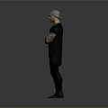 Tattooed Man Wearing Black T Shirt And Pants With Arms Crossed Against Gray Background