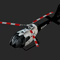 White and Black Helicopter with Red and White Striped Rotors and Tail Number N952DP