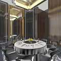 Elegant Private Dining Room With Round Table White Tablecloth Gray Chairs And Yellow Centerpiece