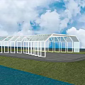 White Framed Glass Sunroom With Green Grass Waterfront And Cloudy Sky