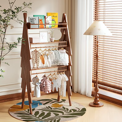 Wooden Ladder Style Clothes Rack Holding Baby Clothes With Books Plants And Table Lamp 3d model