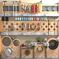Traditional Rustic Feature Wall with Hanging Tools Dried Chilies Colorful Bottles and Wheel Decor