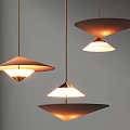 Modern Disc Pendant Lights With Warm Glow Hanging In Minimalist Gray Interior