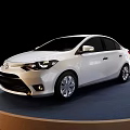 Elegant White Toyota Sedan Showcased On Round Blue Display Platform