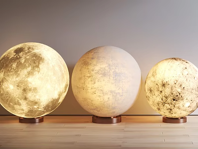 Illuminated Moon Shaped Table Lamps With Textured Surface And Copper Bases On Wooden Floor 3d model