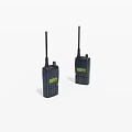 Two Handheld Black Walkie Talkies With Antennas And Green Displays