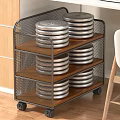 Three Tier Metal Mesh Storage Rack With Stacked Silver Discs On Wooden Shelves And Wheels