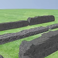 Stone Wood Long Strips With Natural Textured Surface Displayed On Green Grass