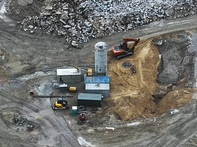 Active Construction Site With Red Excavator Large Debris Pile And Muddy Dirt 3d model