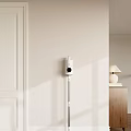 White Wall Mounted Household Appliance In Modern Minimalist Interior With Wooden Cabinet And Table Lamp