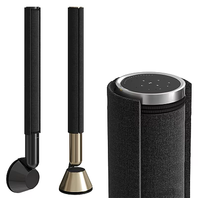 Black Headphones And Cylindrical Speaker With Silver Edge And Small Dots On Top 3d model