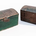 Vintage Wooden Trunks Green And Brown With Rustic Texture And Metal Clasps For Decorative Storage