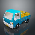 Blue Small Toy Truck With Yellow Boxes Loaded On Cargo Bed
