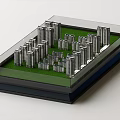 Architectural Model of Urban Area Featuring High Rise Buildings Green Grass and Glass Cover