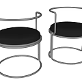 Modern Leisure Chairs With Circular Metal Frame And Black Padded Seats