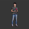 Man holding tablet in colorful striped T-shirt blue jeans and sneakers standing against gray background