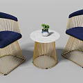 Elegant Leisure Sofa Set Featuring Blue Cushions Golden Metal Frames White Round Table And Green Plant