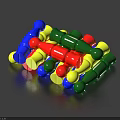Colorful Plastic Figures In Blue Red Green And Yellow Piled On Dark Background