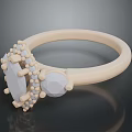 Beige Metal Ring With Oval Center Stone And Small Decorative Stones