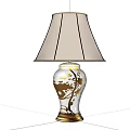 Elegant White and Gold Table Lamp with Floral Patterns and Beige Fabric Shade