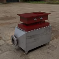 Industrial Metal Fireplace With Gray Body Red Top Bolts And Circular Outlet