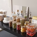 Organized Glass Spice Jars on Kitchen Shelf with Various Spices and Ingredients