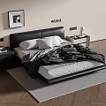 Double Bed With Black Leather Headboard White Pillows Black Comforter And Nightstand Table Lamp
