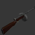 Classic Vintage Weapon Featuring Black Barrel Wooden Stock and Circular Drum Magazine
