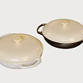 Two Piece Covered Cookware Set With White And Dark Colored Pots And Handles