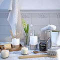 Bathroom Accessories with Towel Candle Lily Vase Soap Dispenser and Marble Countertop