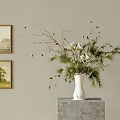 White Vase With Pine Branches White Blooms And Pine Cones On Marble Stand