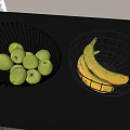 Fresh Green Apples And Bananas In Wire Fruit Baskets On Black Countertop Near White Blinds