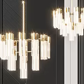 Modern Golden Metal Chandelier With Transparent Cylindrical Glass Shades For Elegant Interior Decor