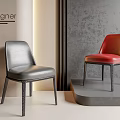 Modern Designer Leather Dining Chairs in Gray and Red on Display Platform