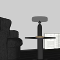 Modern Table Lamp with Transparent Lampshade and Metal Base Near Leather Sofa and Open Book