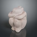 Minimalist Stone Sculpture Carving Of Abstract Crouched Human Figure With Rounded Lines