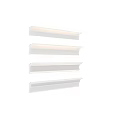 White Decorative Mouldings With Illuminated Design And Different Profiles On Dark Wall