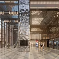 Modern Cinema Lobby Featuring Decorative Columns Warm Lighting And People Walking Through