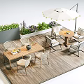 Outdoor Wooden Tables With Chairs Umbrella And Green Plants On Patio Deck