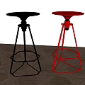 Two Black And Red Bar Stools With Geometric Metal Frames On Wooden Floor