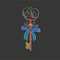 Golden Decorative Key With Blue Bow And Ornate Metal Design