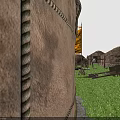 Circular Landscape Sculpture with Woven Texture Set On Sandy Ground Stone Border and Surrounding Structures